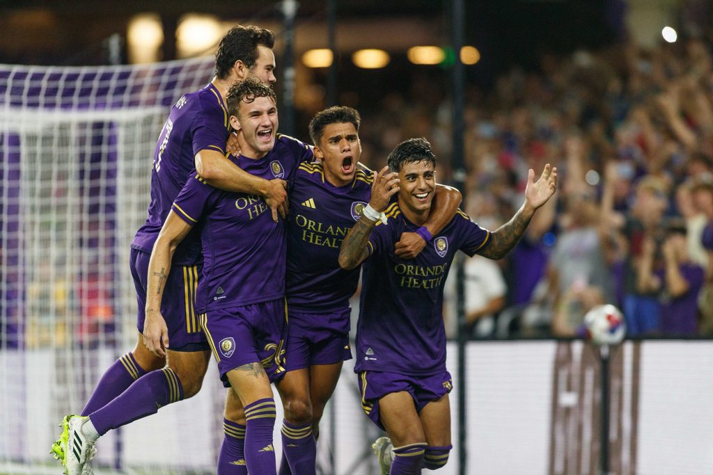 Aug 26, 2023; Orlando, Florida, USA; Orlando City SC midfielder Facundo Torres (17) celebrates goal with forward Ramiro Enrique (7), defender Michael Halliday (26) and forward Jack Lynn (27) against St. Louis CITY SC in the second half at Exploria Stadium. Mandatory Credit: Morgan Tencza-Imagn Images