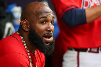 Apr 19, 2024; Atlanta, Georgia, USA; Atlanta Braves Atlanta Braves designated hitter Marcell Ozuna (20) in the dugout before a game against the Texas Rangers at Truist Park. Mandatory Credit: Brett Davis-Imagn Images