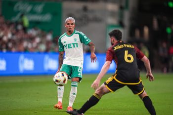 Jul 13, 2024; Austin, Texas, USA;  Austin FC midfielder Daniel Pereira (6) passes the ball past Seattle Sounders FC midfielder João Paulo (6) in the second half at Q2 Stadium. Mandatory Credit: Daniel Dunn-Imagn Images