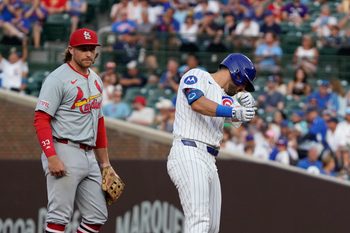 Aug 4, 2024; Chicago, Illinois, USA; Chicago Cubs outfielder Mike Tauchman (40) gestures after hitting a double against the St. Louis Cardinals during the fourth inning at Wrigley Field. Mandatory Credit: David Banks-Imagn Images