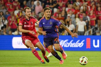 Oct 5, 2024; St. Louis, Missouri, USA; St. Louis CITY SC defender Henry Kessler (5) and Houston Dynamo FC forward Ezequiel Ponce (10) battle for the ball in the second half at CITYPARK. Mandatory Credit: Jeff Le-Imagn Images