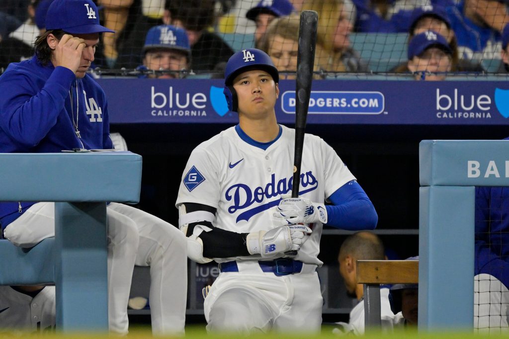 Apr 16, 2025; Los Angeles, California, USA; Los Angeles Dodgers designated hitter Shohei Ohtani (17) looks on from the dugout in the third inning against the Colorado Rockies at Dodger Stadium. Mandatory Credit: Jayne Kamin-Oncea-Imagn Images