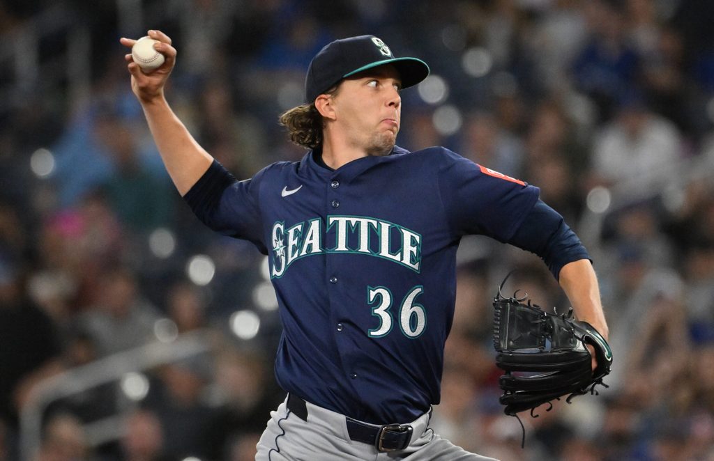 Apr 19, 2025; Toronto, Ontario, CAN; Seattle Mariners starting pitcher Logan Gilbert (36) delivers a pitch against the Toronto Blue Jays in the first inning at Rogers Centre. Mandatory Credit: Dan Hamilton-Imagn Images