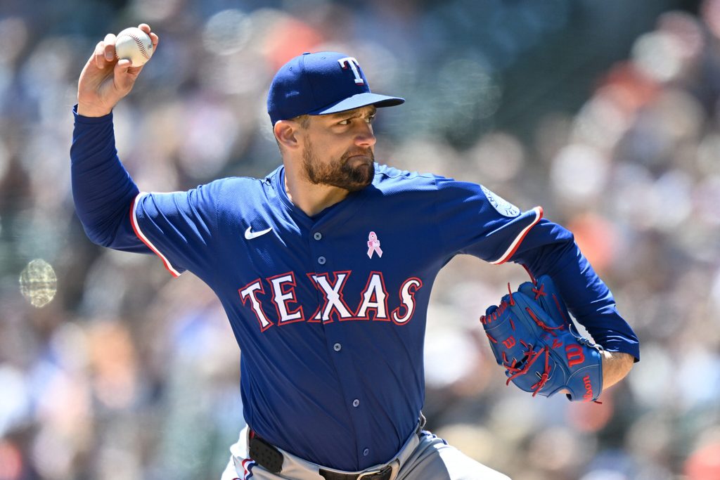May 11, 2025; Detroit, Michigan, USA; Texas Rangers starting pitcher Nathan Eovaldi (17) throws a pitch against the Detroit Tigers in the first inning at Comerica Park. Mandatory Credit: Lon Horwedel-Imagn Images