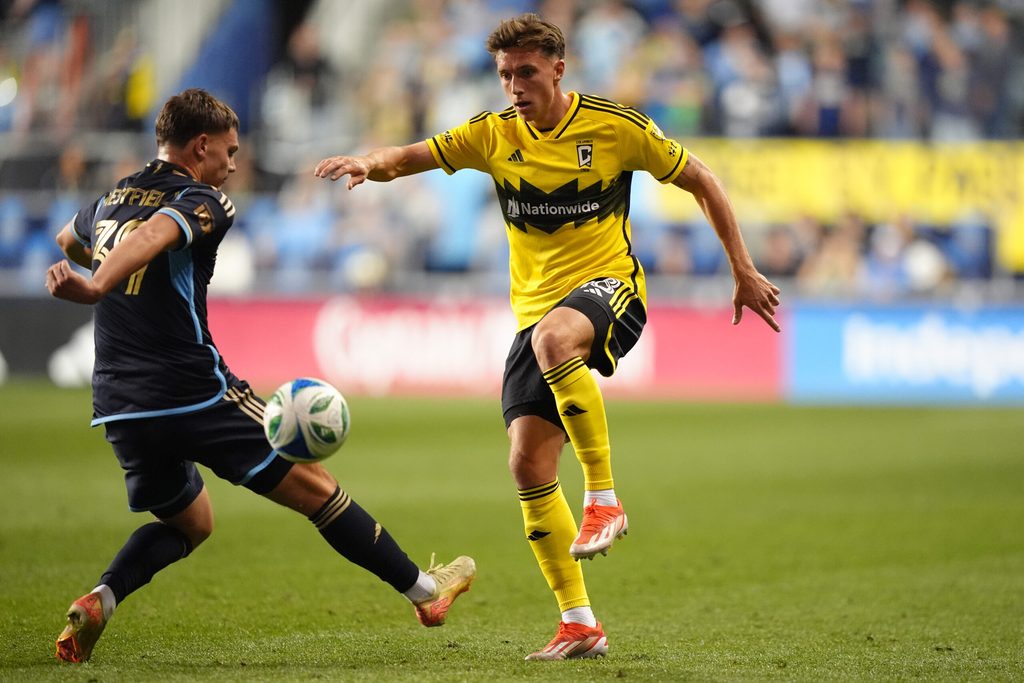 May 10, 2025; Chester, Pennsylvania, USA; Columbus Crew defender Malte Amundsen (18) passes the ball against Philadelphia Union defender Francis Westfield (39) in the second half at Subaru Park. Mandatory Credit: Kyle Ross-Imagn Images