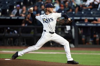 Jun 4, 2025; St. Petersburg, Florida, USA;  Tampa Bay Rays pitcher Shane Baz (11) throws a pitch against the Texas Rangers at George M. Steinbrenner Field. Mandatory Credit: Kim Klement Neitzel-Imagn Images