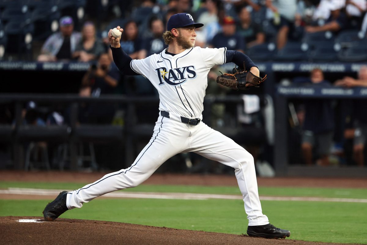 Jun 4, 2025; St. Petersburg, Florida, USA; Tampa Bay Rays pitcher Shane Baz (11) throws a pitch against the Texas Rangers at George M. Steinbrenner Field. Mandatory Credit: Kim Klement Neitzel-Imagn Images