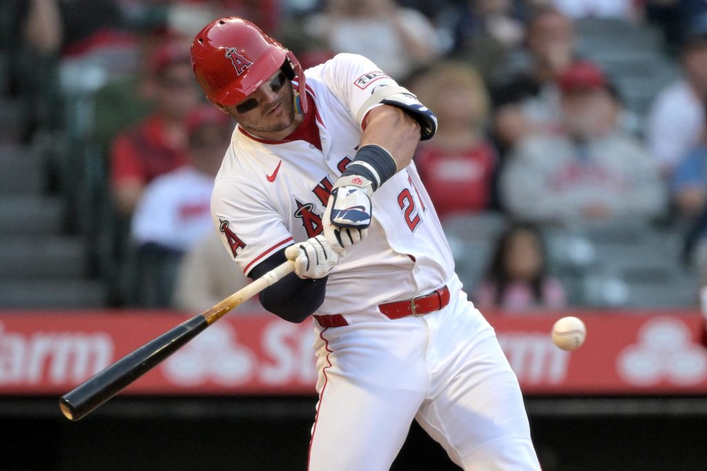 Jun 9, 2025; Anaheim, California, USA; Los Angeles Angels right fielder Mike Trout (27) singles in a run in the third inning against the Athletics at Angel Stadium. Mandatory Credit: Jayne Kamin-Oncea-Imagn Images