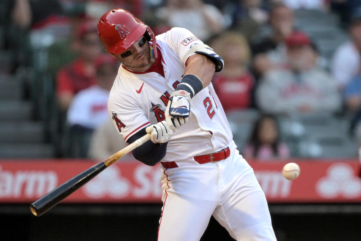 Jun 9, 2025; Anaheim, California, USA; Los Angeles Angels right fielder Mike Trout (27) singles in a run in the third inning against the Athletics at Angel Stadium. Mandatory Credit: Jayne Kamin-Oncea-Imagn Images