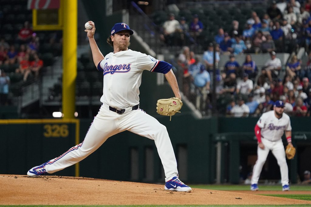 Jun 14, 2025; Arlington, Texas, USA; Texas Rangers pitcher Jacob deGrom (48) throws to the plate during the first inning against the Chicago White Sox at Globe Life Field. Mandatory Credit: Raymond Carlin III-Imagn Images