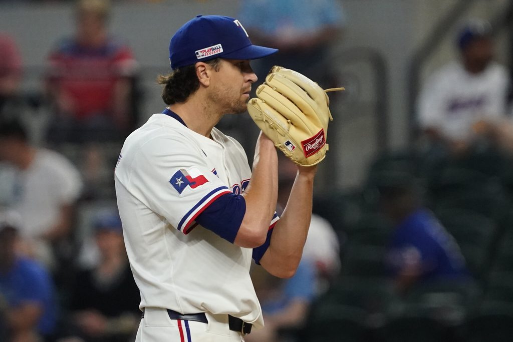 Jun 14, 2025; Arlington, Texas, USA; Texas Rangers pitcher Jacob deGrom (48) looks in for the sign during the fourth inning against the Chicago White Sox at Globe Life Field. Mandatory Credit: Raymond Carlin III-Imagn Images