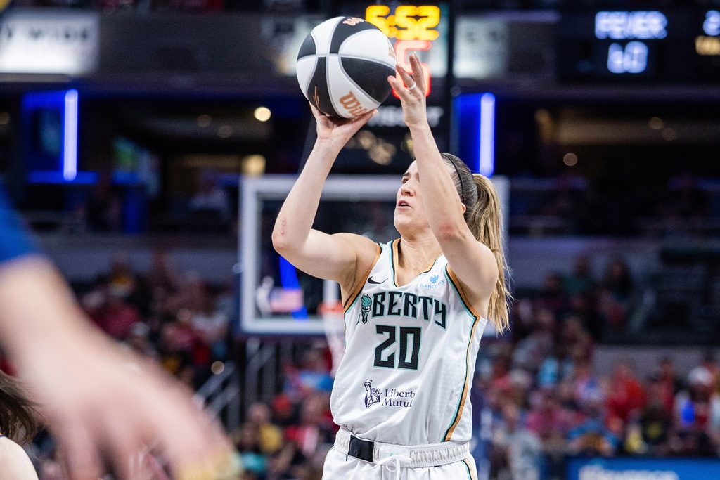 Jun 14, 2025; Indianapolis, Indiana, USA; New York Liberty guard Sabrina Ionescu (20) shoots the ball in the second half against the Indiana Fever at Gainbridge Fieldhouse. Mandatory Credit: Trevor Ruszkowski-Imagn Images