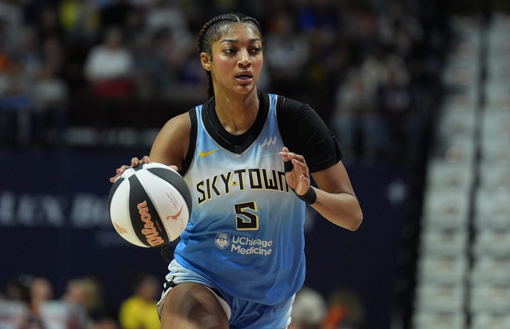 Jun 15, 2025; Uncasville, Connecticut, USA; Chicago Sky forward Angel Reese (5) returns the ball against the Connecticut Sun in the first half at Mohegan Sun Arena. Mandatory Credit: David Butler II-Imagn Images
