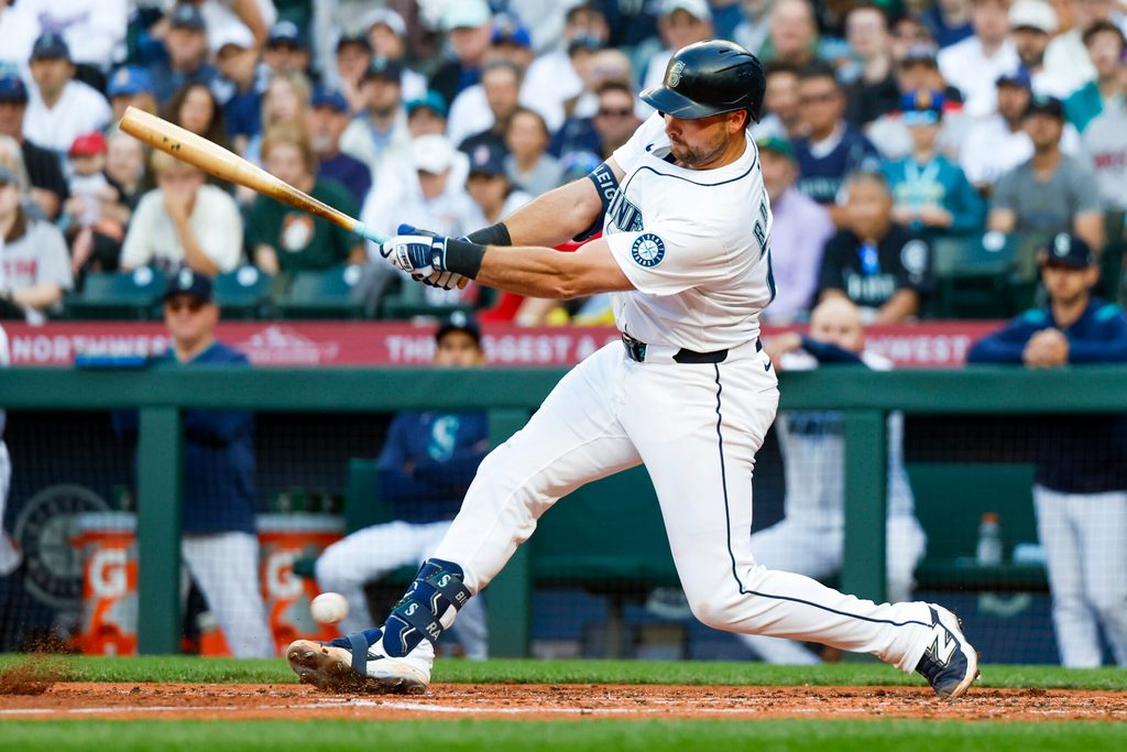 Jun 16, 2025; Seattle, Washington, USA; Seattle Mariners catcher Cal Raleigh (29) strikes out on a pitch in the dirt to end during the third inning against the Boston Red Sox at T-Mobile Park. Mandatory Credit: Joe Nicholson-Imagn Images