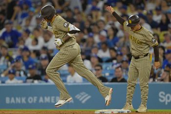 Jun 16, 2025; Los Angeles, California, USA;  San Diego Padres third baseman Manny Machado (13) rounds the bases after a solo home run in the sixth inning against the Los Angeles Dodgers at Dodger Stadium. Mandatory Credit: Jayne Kamin-Oncea-Imagn Images