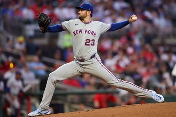 Jun 17, 2025; Atlanta, Georgia, USA; New York Mets starting pitcher David Peterson (23) throws against the Atlanta Braves in the first inning at Truist Park. Mandatory Credit: Brett Davis-Imagn Images