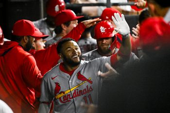 Jun 17, 2025; Chicago, Illinois, USA;  St. Louis Cardinals outfielder Victor Scott II (11) celebrates in the dugout after hitting a two-run home run against the Chicago White Sox during the ninth inning at Rate Field. Mandatory Credit: Matt Marton-Imagn Images