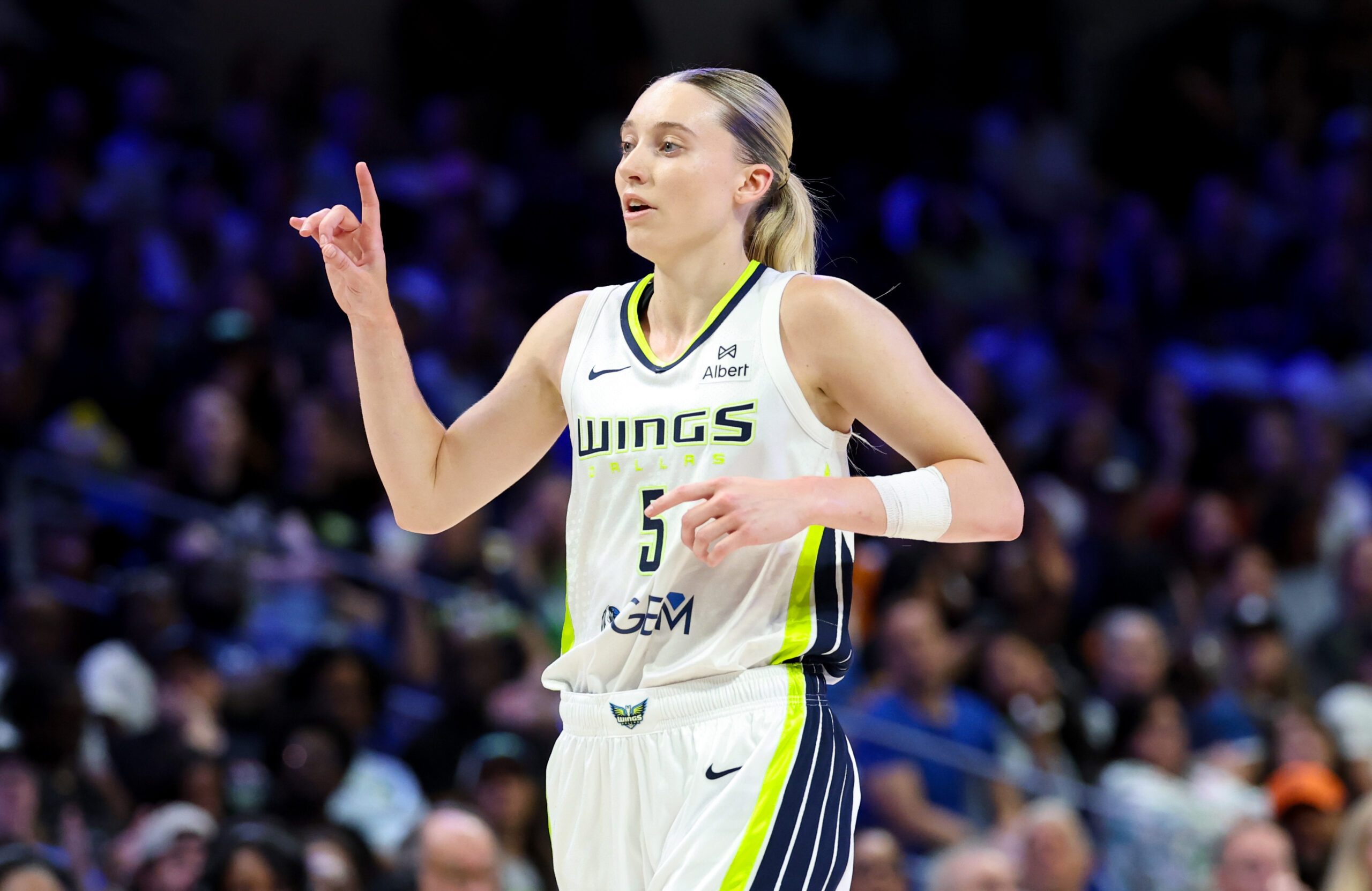 Jun 17, 2025; Arlington, Texas, USA;  Dallas Wings guard Paige Bueckers (5) reacts during the second half against the Golden State Valkyries at College Park Center. Mandatory Credit: Kevin Jairaj-Imagn Images