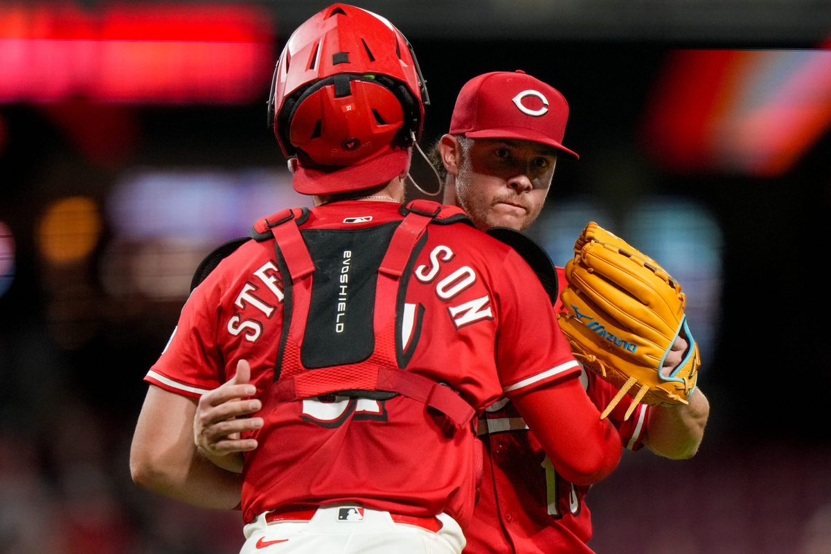 Cincinnati Reds pitcher Emilio Pagán (15) and catcher Tyler Stephenson (37) celebrate the final out of the ninth inning of the MLB interleague game between the Cincinnati Reds and the Minnesota Twins at Great American Ball Park in downtown Cincinnati on Tuesday, June 17, 2025. The Reds won 6-5.