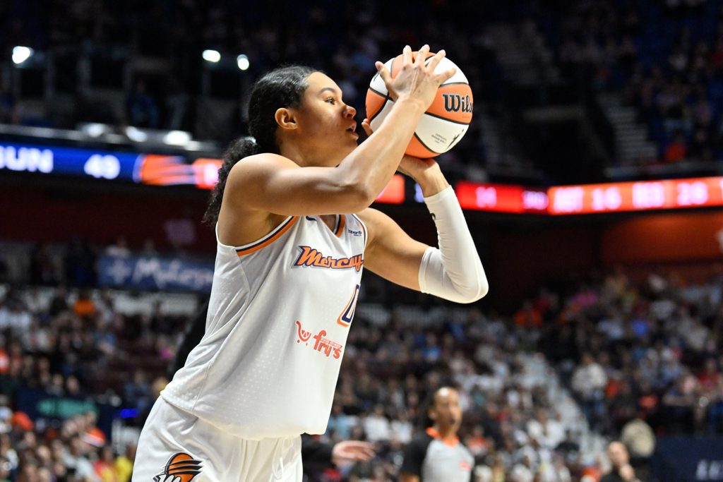 Jun 18, 2025; Uncasville, Connecticut, USA; Phoenix Mercury forward Satou Sabally (0) shoots the ball against the Connecticut Sun during the second half at Mohegan Sun Arena. Mandatory Credit: Eric Canha-Imagn Images
