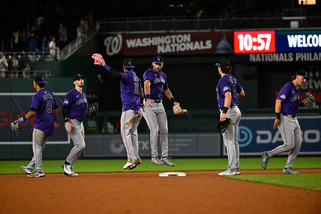 Jun 18, 2025; Washington, District of Columbia, USA; Colorado Rockies celebrate after defeating the Washington Nationals at Nationals Park. Mandatory Credit: Brad Mills-Imagn Images