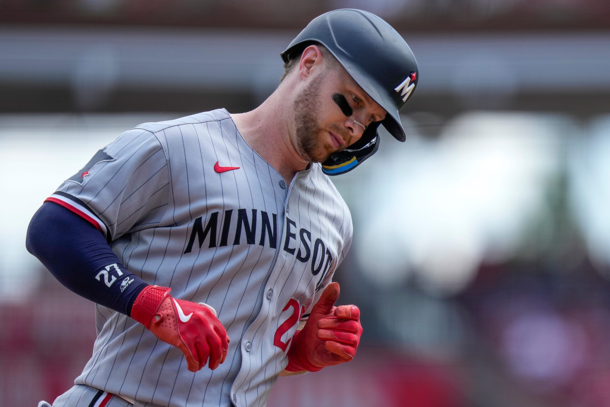 Minnesota Twins catcher Ryan Jeffers (27) rounds third on a two-run home run in the eighth inning of the MLB interleague game between the Cincinnati Reds and the Minnesota Twins at Great American Ball Park in downtown Cincinnati on Thursday, June 19, 2025. The Twins won, 12-5.