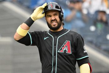 Jun 19, 2025; Toronto, Ontario, CAN;  Arizona Diamondbacks third baseman Eugenio Suarez (28) reacts after striking out against the Toronto Blue Jays in the ninth inning at Rogers Centre. Mandatory Credit: Dan Hamilton-Imagn Images