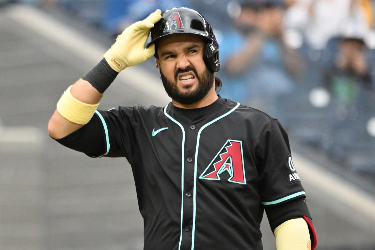 Jun 19, 2025; Toronto, Ontario, CAN; Arizona Diamondbacks third baseman Eugenio Suarez (28) reacts after striking out against the Toronto Blue Jays in the ninth inning at Rogers Centre. Mandatory Credit: Dan Hamilton-Imagn Images