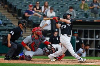 Jun 19, 2025; Chicago, Illinois, USA; Chicago White Sox left fielder Andrew Benintendi (23) hits a grand slam against the St. Louis Cardinals during the seventh inning of game two of a doubleheader at Rate Field. Mandatory Credit: Kamil Krzaczynski-Imagn Images