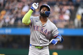 Jun 11, 2025; Pittsburgh, Pennsylvania, USA; Texas Rangers right fielder Adolis Garcia Celebrates after hitting a solo home run against the Pittsburgh Pirates during the fourth inning at PNC Park. Mandatory Credit: Philip G. Pavely-Imagn Images