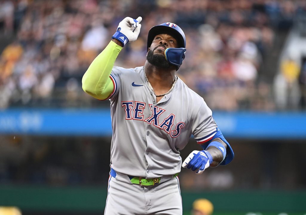 Jun 11, 2025; Pittsburgh, Pennsylvania, USA; Texas Rangers right fielder Adolis Garcia Celebrates after hitting a solo home run against the Pittsburgh Pirates during the fourth inning at PNC Park. Mandatory Credit: Philip G. Pavely-Imagn Images