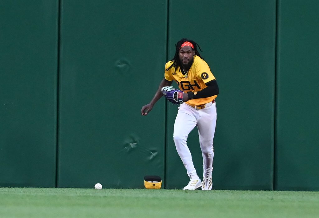 Jun 11, 2025; Pittsburgh, Pennsylvania, USA; Pittsburgh Pirates center fielder Oneil Cruz plays a ball off the wall against the Texas Rangers at PNC Park. Mandatory Credit: Philip G. Pavely-Imagn Images