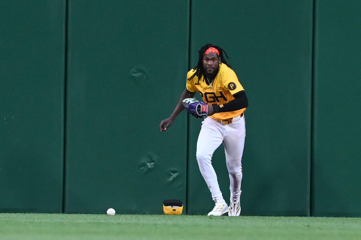 Jun 11, 2025; Pittsburgh, Pennsylvania, USA; Pittsburgh Pirates center fielder Oneil Cruz plays a ball off the wall against the Texas Rangers at PNC Park. Mandatory Credit: Philip G. Pavely-Imagn Images
