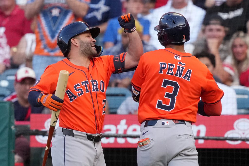 Jun 20, 2025; Anaheim, California, USA; Houston Astros shortstop Jeremy Pena (3) celebrates with designated hitter Jose Altuve (27) after hitting a home run in the first inning against the Los Angeles Angels at Angel Stadium. Mandatory Credit: Kirby Lee-Imagn Images