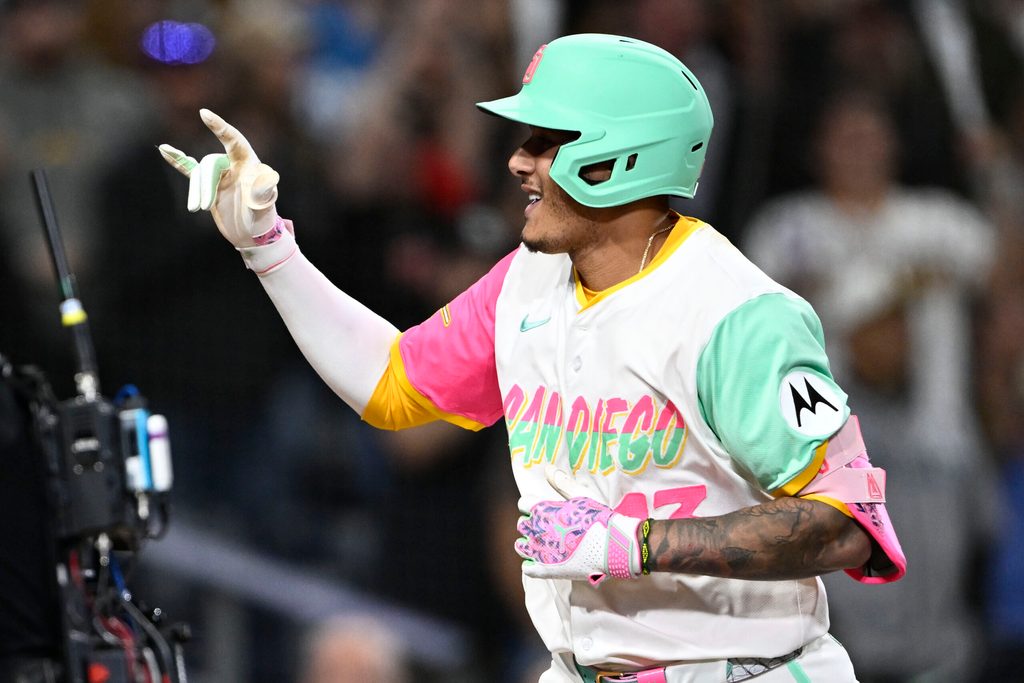 Jun 20, 2025; San Diego, California, USA; San Diego Padres third baseman Manny Machado (13) rounds the bases after hitting a solo home run during the ninth inning against the against the Kansas City Royals at Petco Park. Mandatory Credit: Denis Poroy-Imagn Images