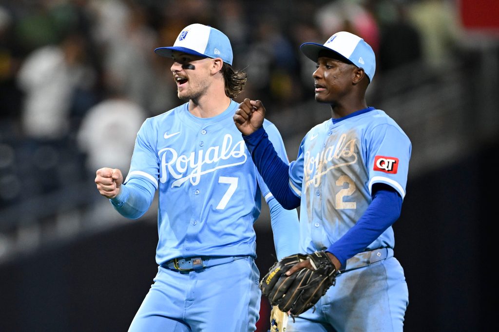 Jun 20, 2025; San Diego, California, USA; Kansas City Royals shortstop Bobby Witt Jr. (7) and Tyler Tolbert (2) celebrate after the Royals beat the San Diego Padres 6-5 at Petco Park. Mandatory Credit: Denis Poroy-Imagn Images