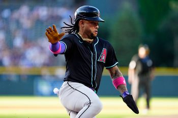Jun 21, 2025; Denver, Colorado, USA; Arizona Diamondbacks second baseman Ketel Marte (4) scores a run in in the first inning against the Colorado Rockies at Coors Field. Mandatory Credit: Ron Chenoy-Imagn Images