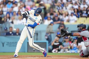 Jun 21, 2025; Los Angeles, California, USA; Los Angeles Dodgers two-way player Shohei Ohtani (17) flies out to center during the first inning against against the Washington Nationals at Dodger Stadium. Mandatory Credit: Kirby Lee-Imagn Images