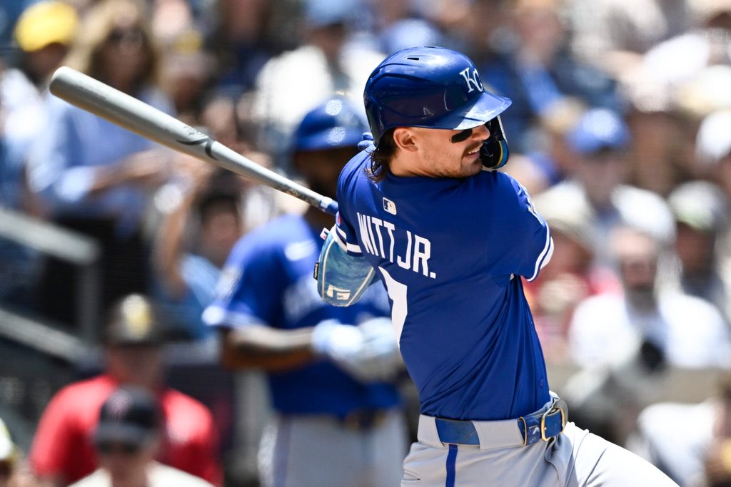 Jun 22, 2025; San Diego, California, USA; Kansas City Royals shortstop Bobby Witt Jr. (7) hits a single during the first inning against the San Diego Padres at Petco Park. Mandatory Credit: Denis Poroy-Imagn Images