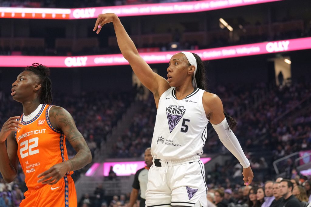 Jun 22, 2025; San Francisco, California, USA; Golden State Valkyries forward Kayla Thornton (5) follows through after shooting against Connecticut Sun guard Saniya Rivers (22) during the first quarter at Chase Center. Mandatory Credit: Darren Yamashita-Imagn Images