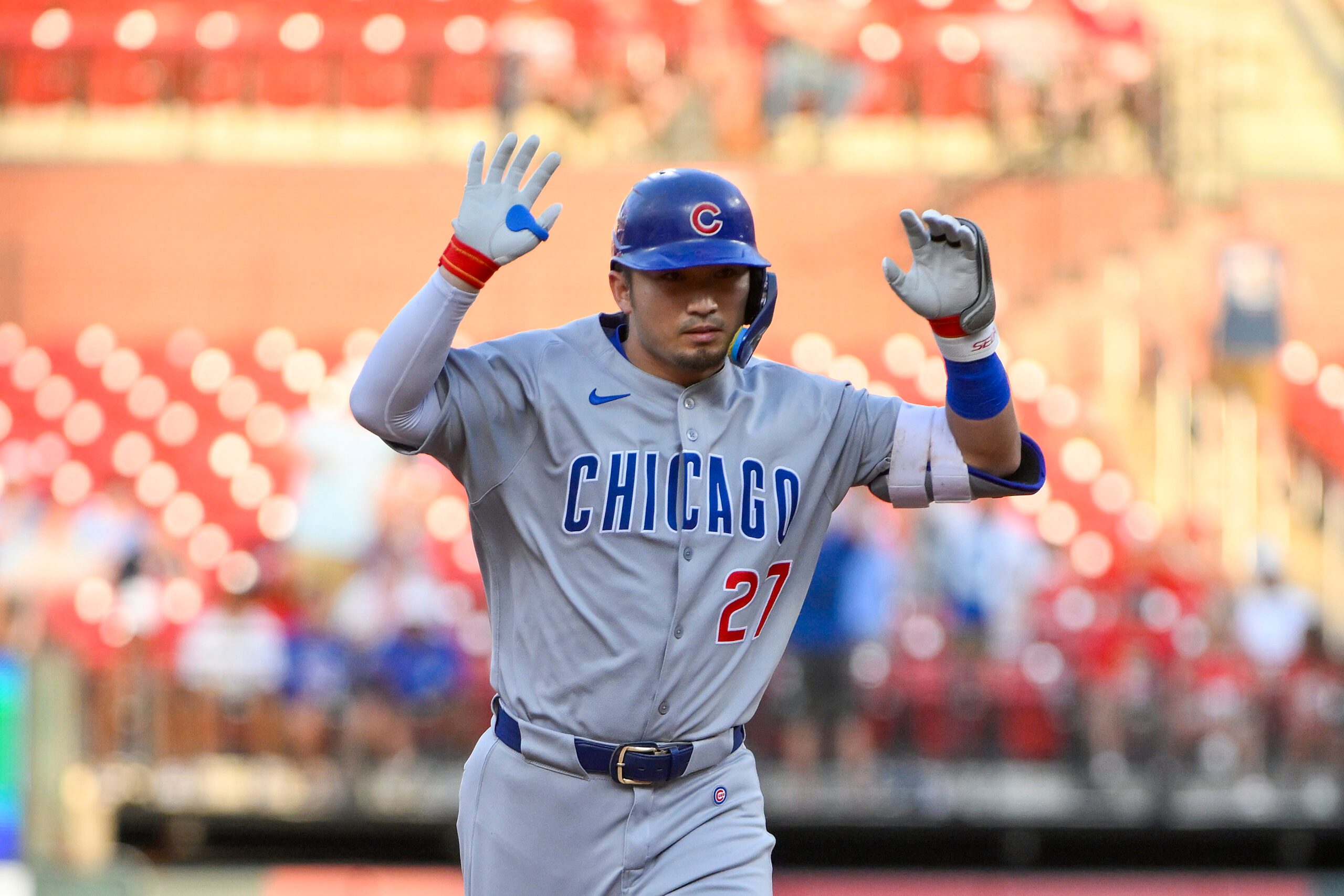 Jun 24, 2025; St. Louis, Missouri, USA;  Chicago Cubs left fielder Seiya Suzuki (27) reacts as he runs the bases after hitting a three run home run against the St. Louis Cardinals during the third inning at Busch Stadium. Mandatory Credit: Jeff Curry-Imagn Images