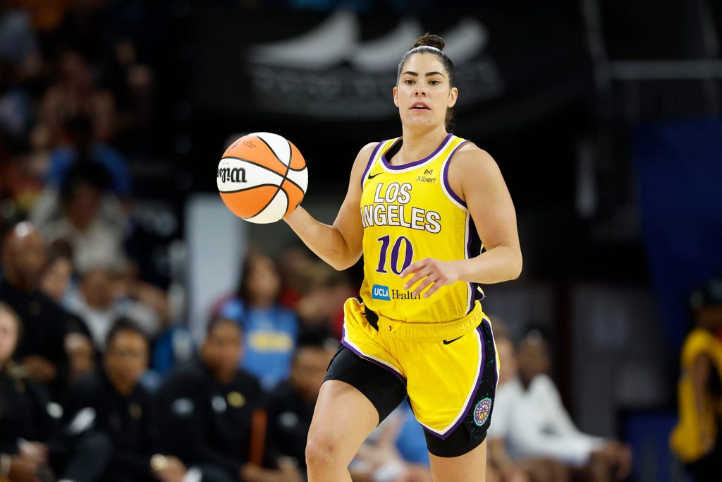 Jun 24, 2025; Chicago, Illinois, USA; Los Angeles Sparks guard Kelsey Plum (10) brings the ball up court against the Chicago Sky during the second half at Wintrust Arena. Mandatory Credit: Kamil Krzaczynski-Imagn Images