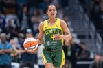 Jun 22, 2025; Seattle, Washington, USA;  Seattle Storm guard Skylar Diggins (4) dribbles the ball against the New York Liberty at Climate Pledge Arena. Mandatory Credit: Stephen Brashear-Imagn Images