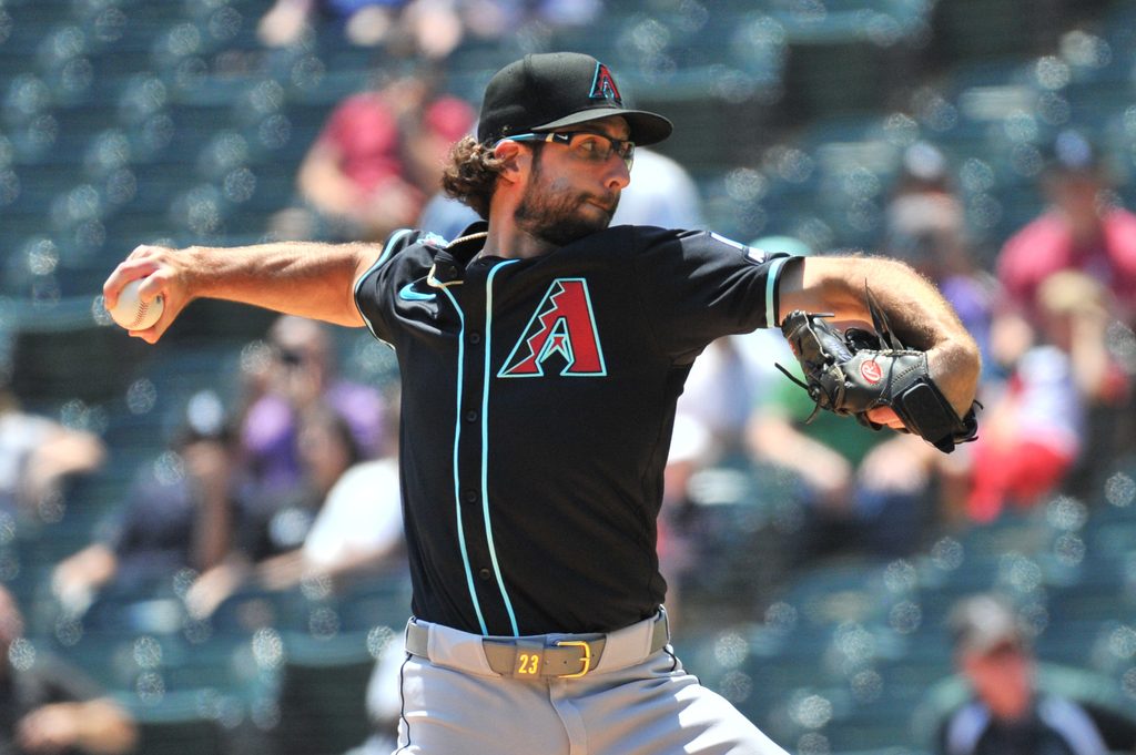 Jun 25, 2025; Chicago, Illinois, USA; Arizona Diamondbacks pitcher Zac Gallen pitches during the first inning against the Chicago White Sox at Rate Field. Mandatory Credit: Patrick Gorski-Imagn Images