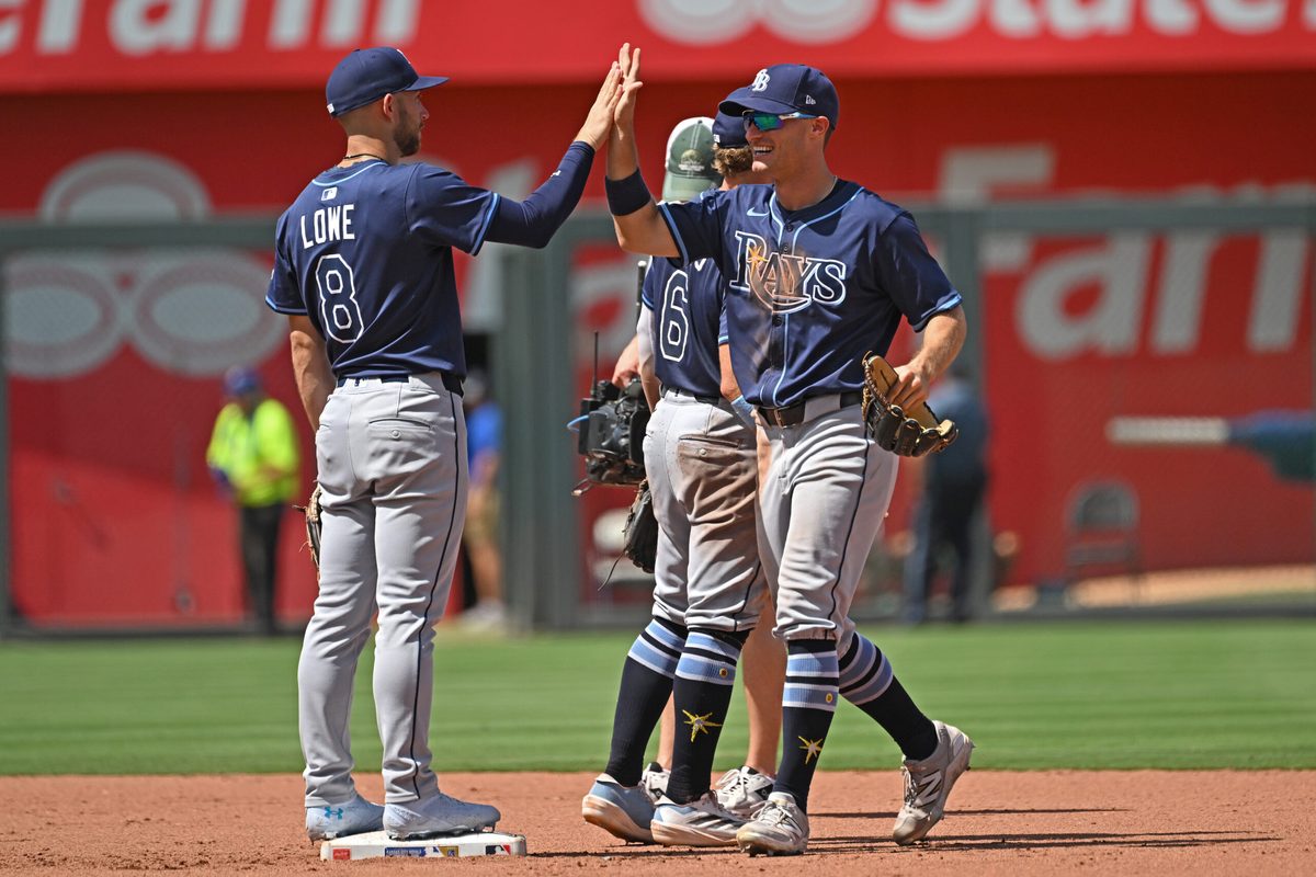 Jun 26, 2025; Kansas City, Missouri, USA; Tampa Bay Rays left fielder Jake Mangum (28) celebrates with teammate second base Brandon Lowe (8) after beating the Kansas City Royals at Kauffman Stadium. Mandatory Credit: Peter Aiken-Imagn Images
