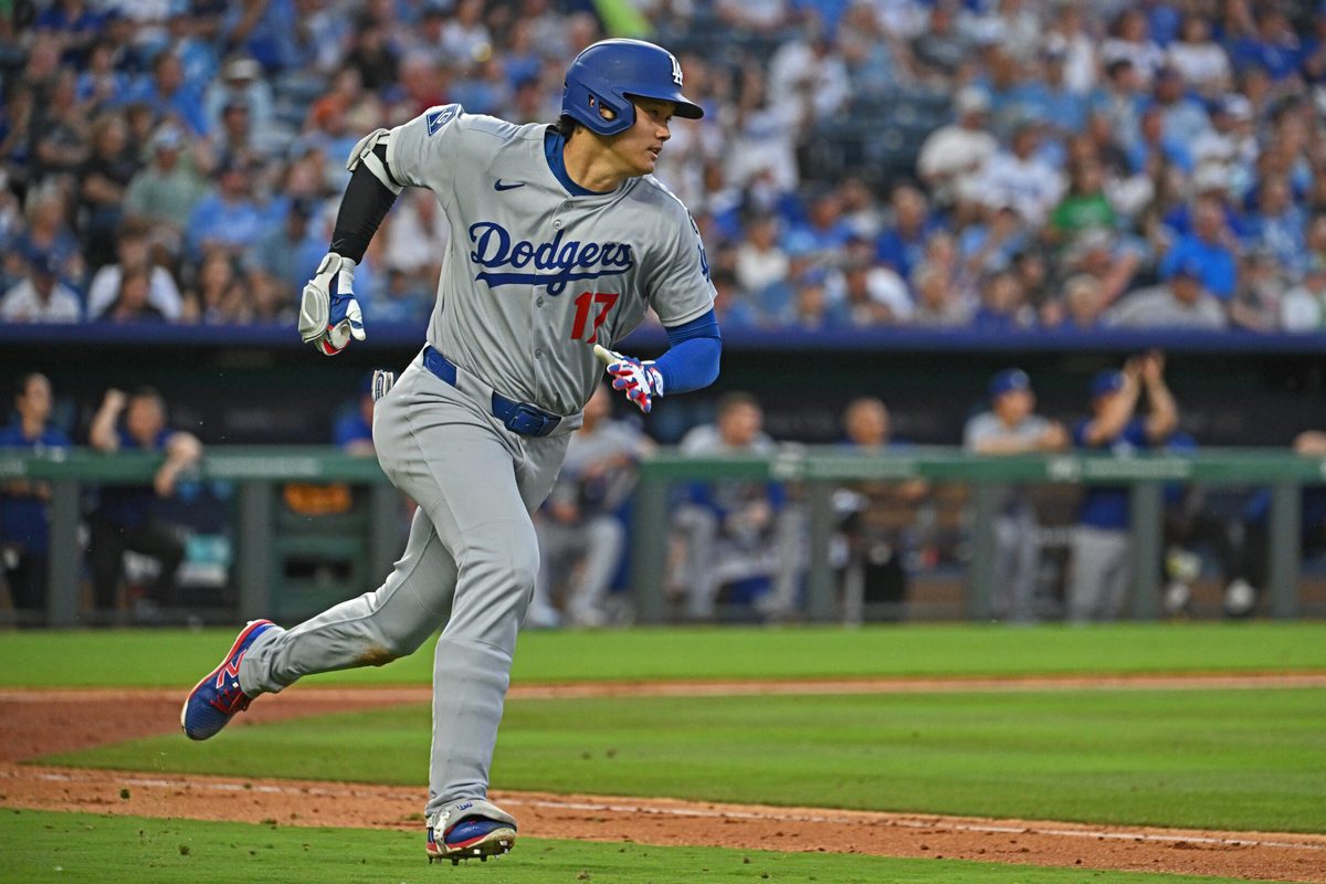 Jun 27, 2025; Kansas City, Missouri, USA; Los Angeles Dodgers designated hitter Shohei Ohtani (17) hits an RBI triple in the fifth inning against the Kansas City Royals at Kauffman Stadium. Mandatory Credit: Peter Aiken-Imagn Images