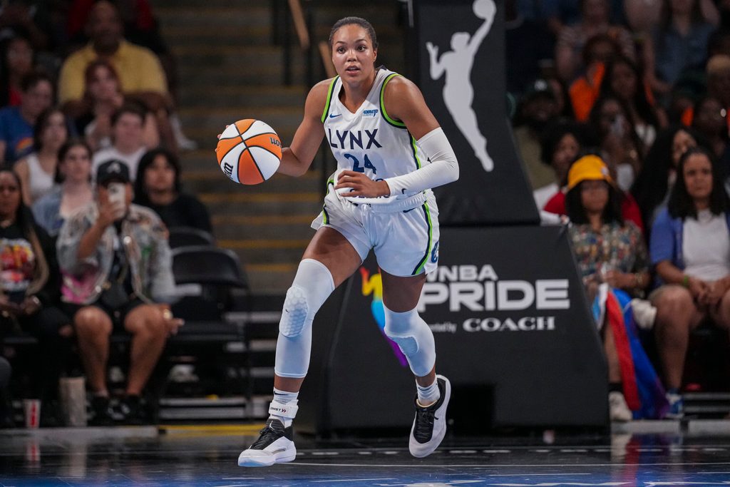 Jun 27, 2025; College Park, Georgia, USA; Minnesota Lynx forward Napheesa Collier (24) brings the ball up the court against the Atlanta Dream during the second half at Gateway Center Arena at College Park. Mandatory Credit: Dale Zanine-Imagn Images