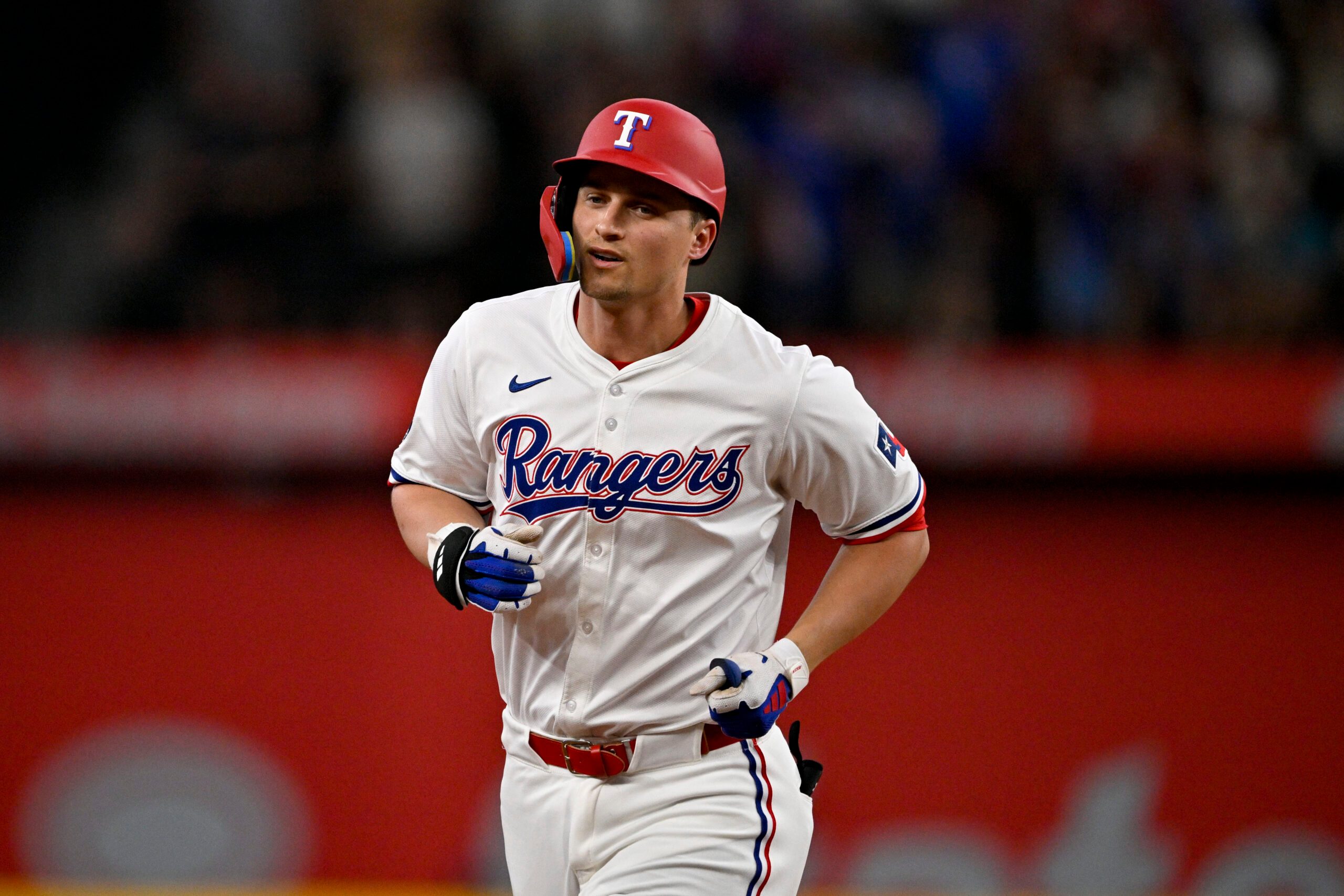 Jun 28, 2025; Arlington, Texas, USA; Texas Rangers shortstop Corey Seager (5) rounds the bases after he hits a two run home run against the Seattle Mariners during the third inning at Globe Life Field. Mandatory Credit: Jerome Miron-Imagn Images