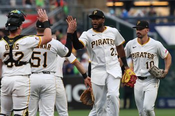 Jun 28, 2025; Pittsburgh, Pennsylvania, USA; The Pittsburgh Pirates celebrate after defeating the New York Mets at PNC Park. Mandatory Credit: Charles LeClaire-Imagn Images