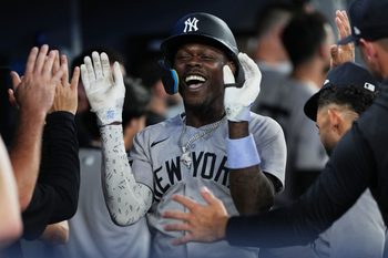 Jun 30, 2025; Toronto, Ontario, CAN; New York Yankees third baseman Jazz Chisholm Jr. (13) celebrates in the dugout after hitting a two-run home run against the Toronto Blue Jays during the fourth inning at Rogers Centre. Mandatory Credit: Nick Turchiaro-Imagn Images